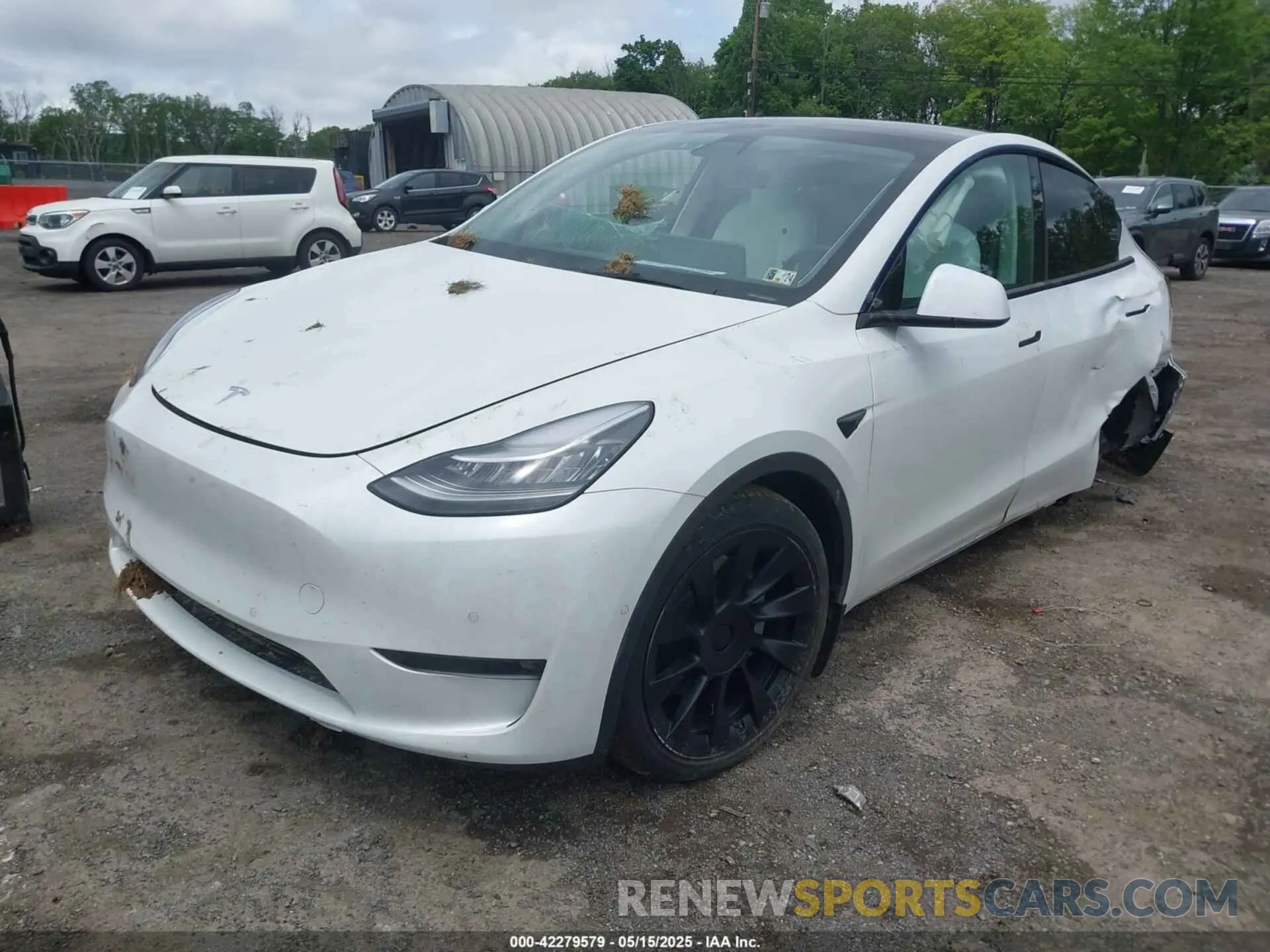 2 fotografías del automóvil dañado 5YJYGDEE8MF151699 TESLA MODEL Y 2021