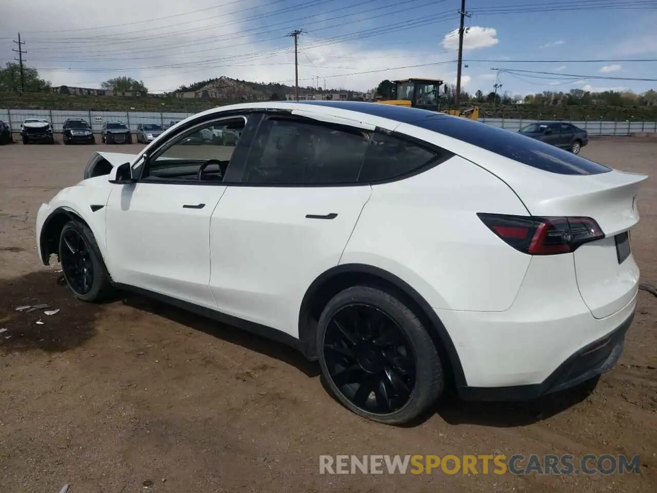 2 fotografías del automóvil dañado 5YJYGDEE8MF207009 TESLA MODEL Y 2021
