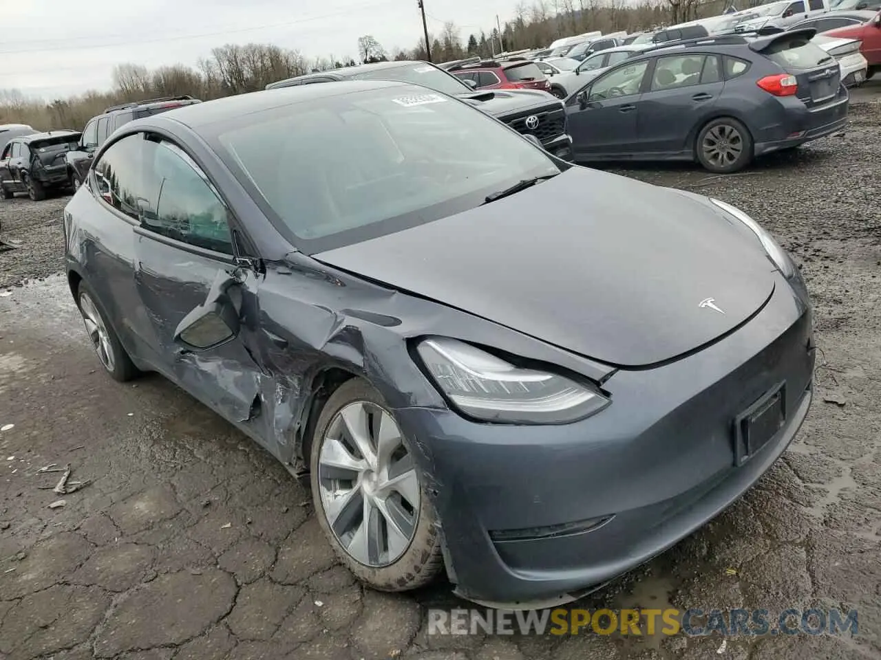 4 fotografías del automóvil dañado 5YJYGDEE8MF241886 TESLA MODEL Y 2021