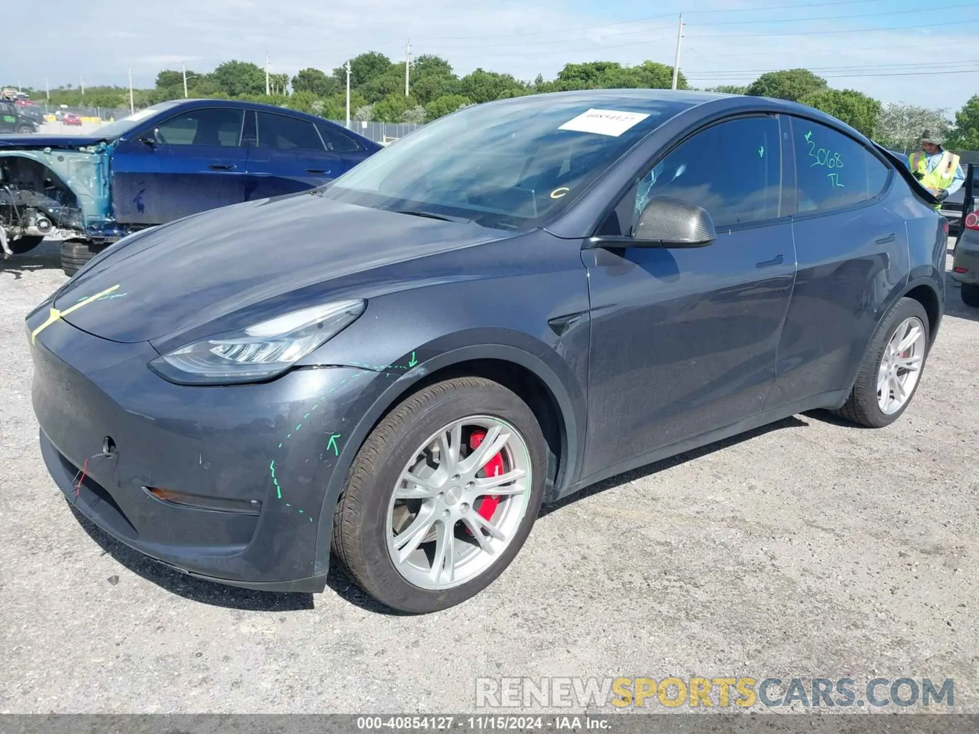 2 fotografías del automóvil dañado 5YJYGDEE8MF262768 TESLA MODEL Y 2021