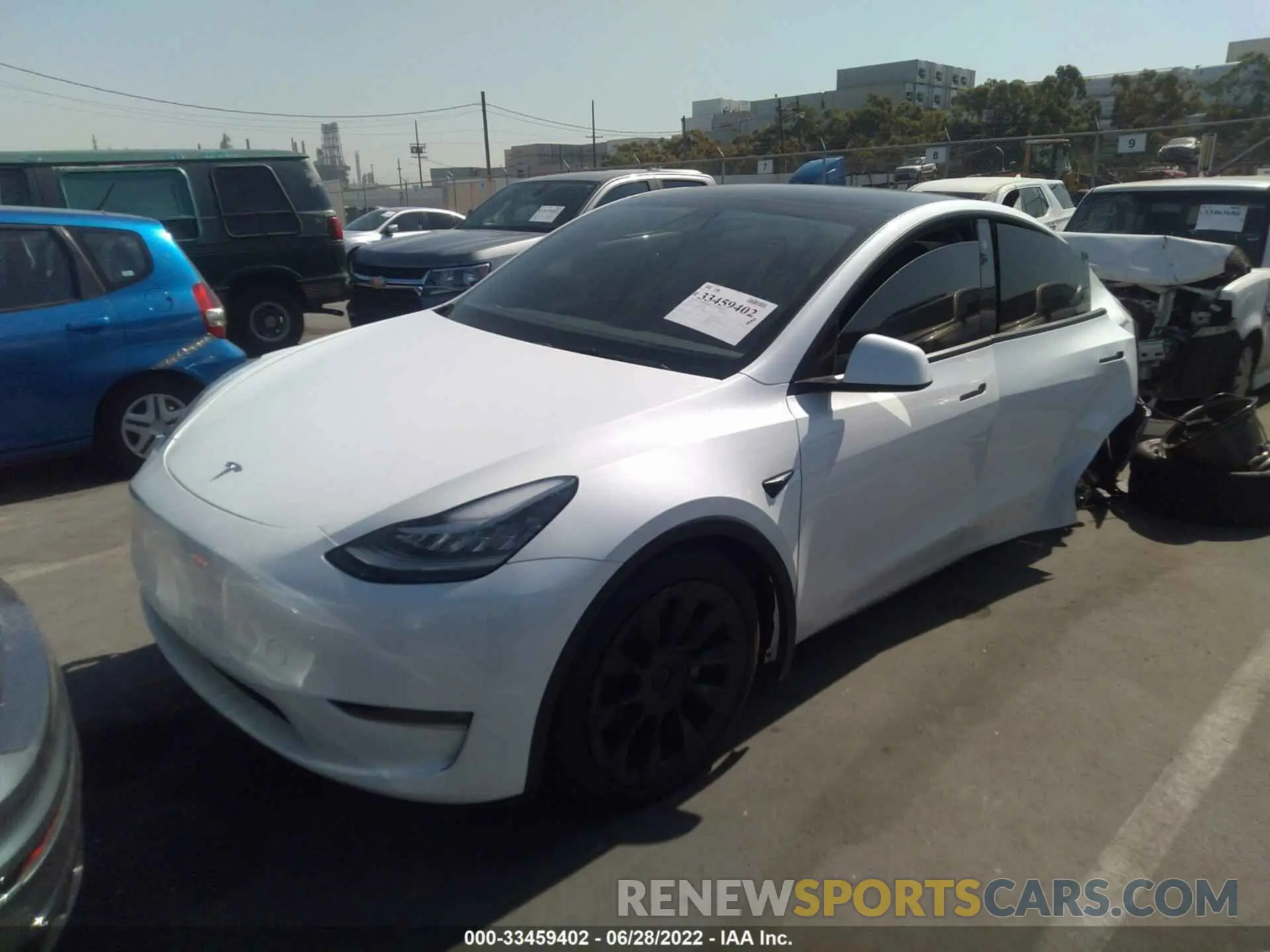2 fotografías del automóvil dañado 5YJYGDEE8MF272104 TESLA MODEL Y 2021