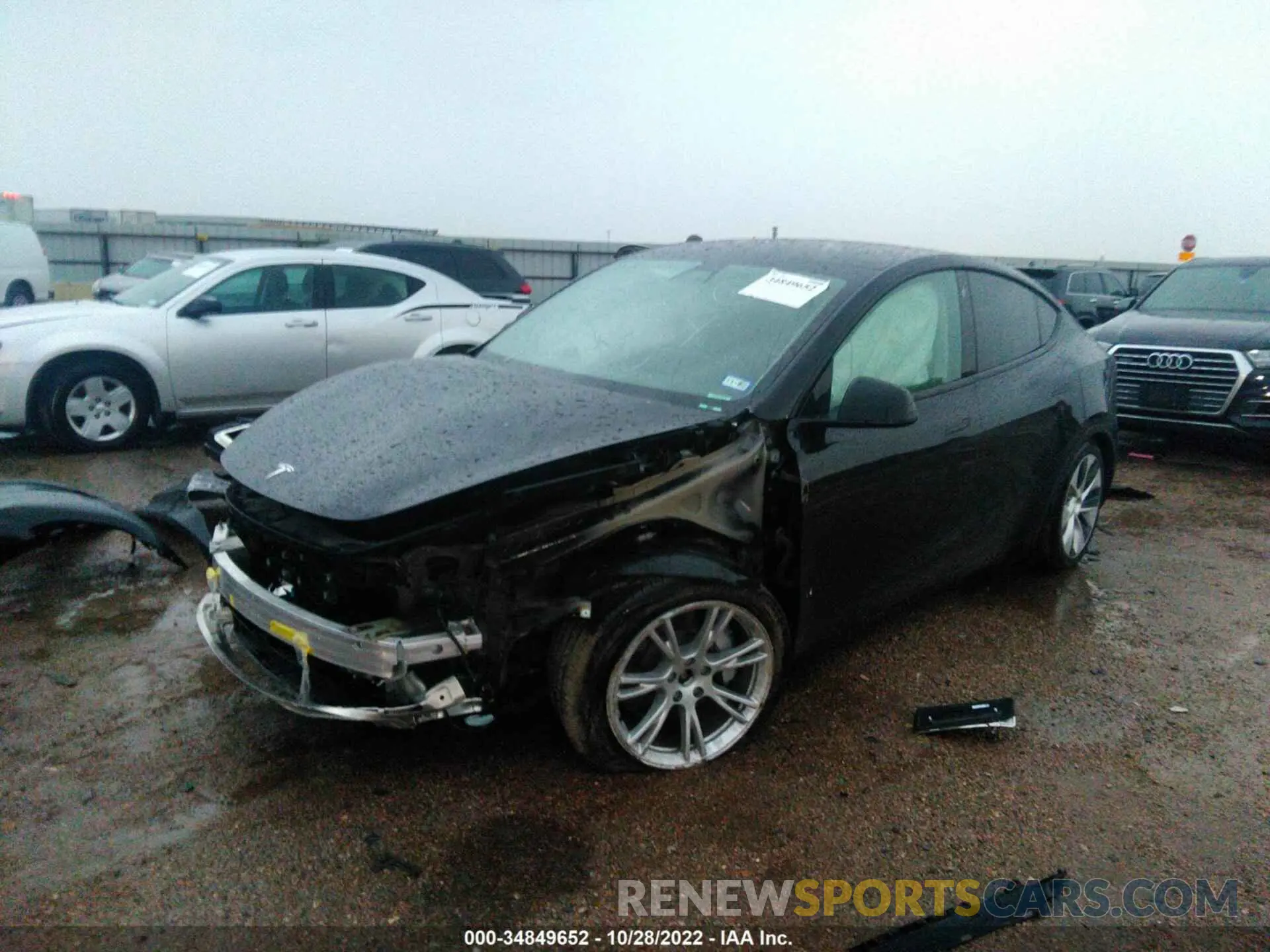 2 fotografías del automóvil dañado 5YJYGDEE8MF305053 TESLA MODEL Y 2021