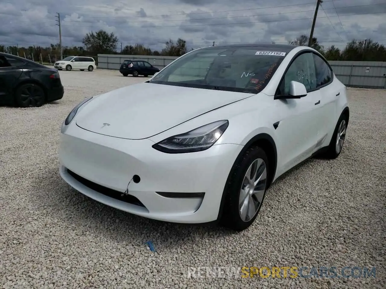 2 fotografías del automóvil dañado 5YJYGDEE9MF069223 TESLA MODEL Y 2021