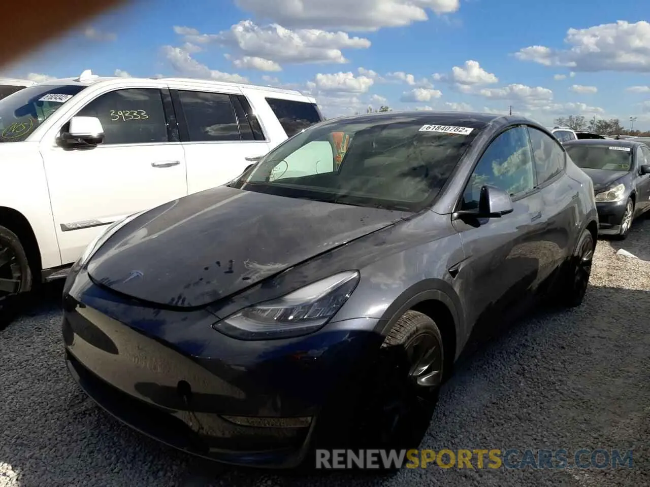 2 fotografías del automóvil dañado 5YJYGDEE9MF108585 TESLA MODEL Y 2021