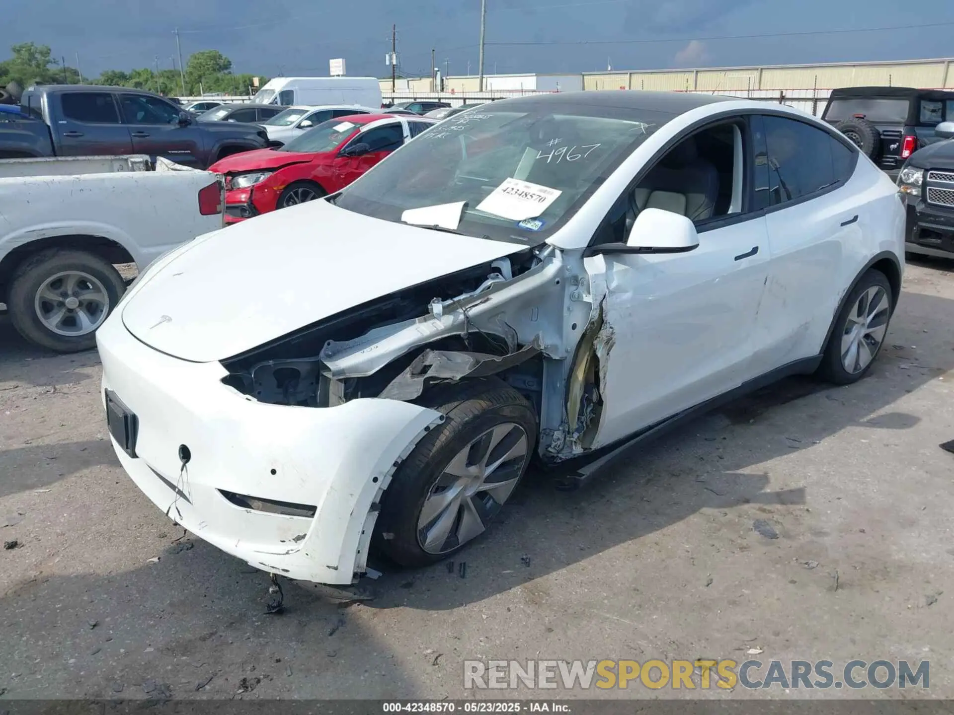 2 fotografías del automóvil dañado 5YJYGDEE9MF114967 TESLA MODEL Y 2021