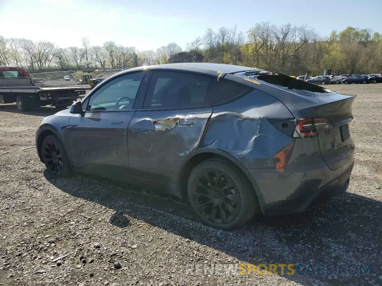 2 fotografías del automóvil dañado 5YJYGDEE9MF119974 TESLA MODEL Y 2021