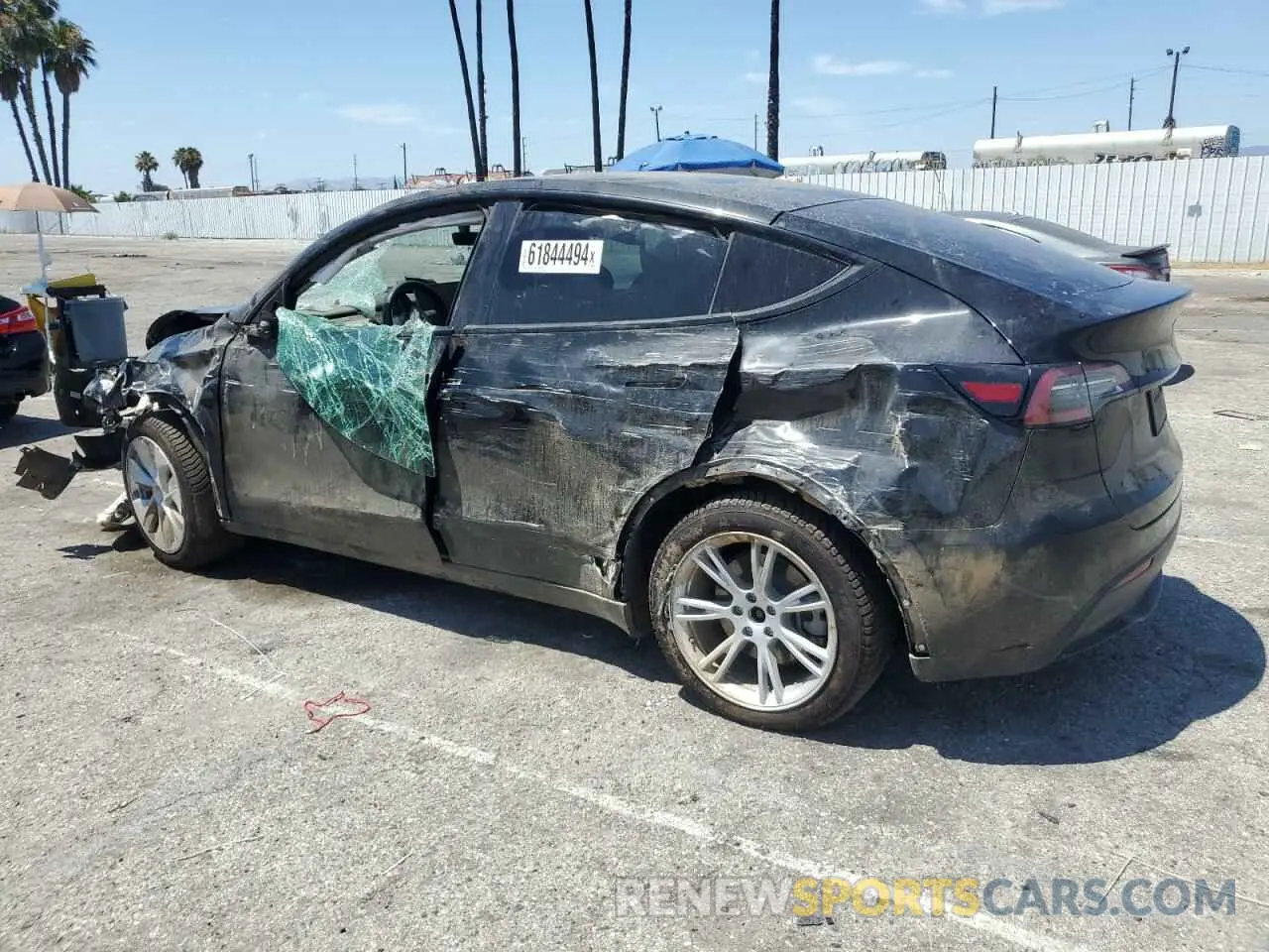 2 fotografías del automóvil dañado 5YJYGDEE9MF148472 TESLA MODEL Y 2021