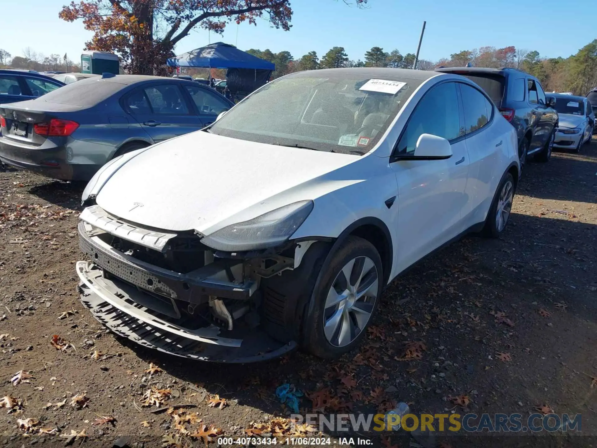 2 fotografías del automóvil dañado 5YJYGDEE9MF209142 TESLA MODEL Y 2021