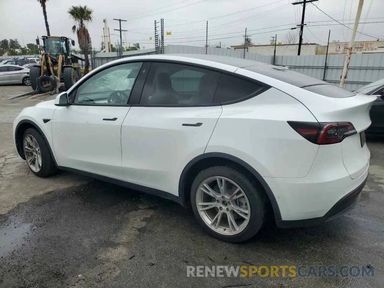2 fotografías del automóvil dañado 5YJYGDEE9MF282138 TESLA MODEL Y 2021