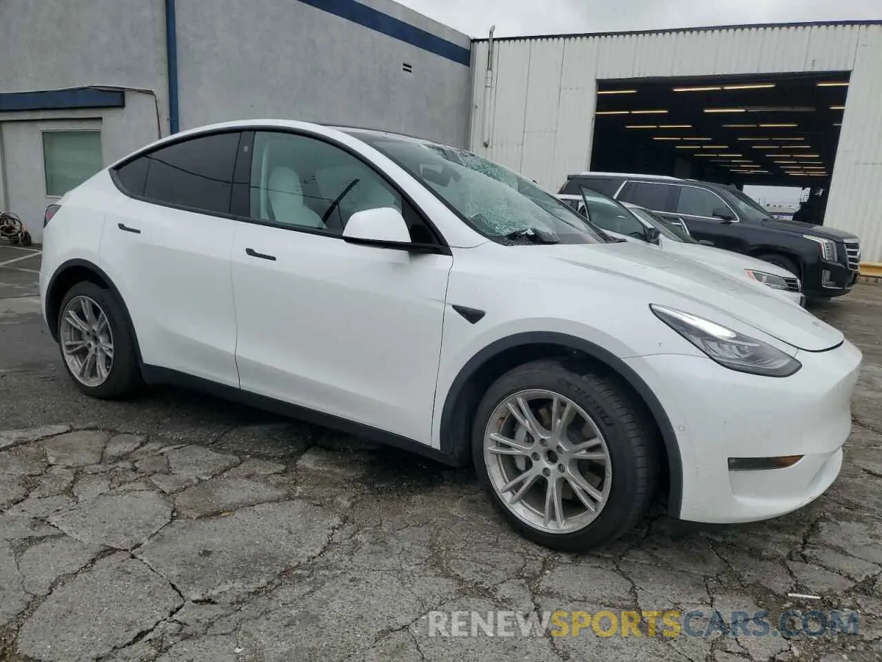 4 fotografías del automóvil dañado 5YJYGDEE9MF282138 TESLA MODEL Y 2021