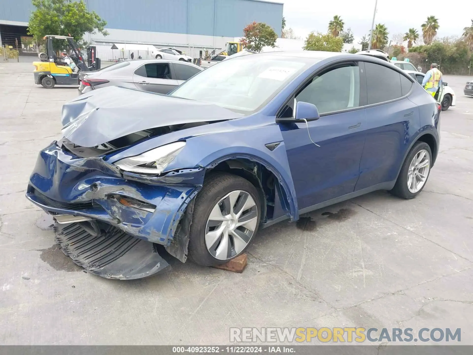 2 fotografías del automóvil dañado 5YJYGDEE9MF295956 TESLA MODEL Y 2021