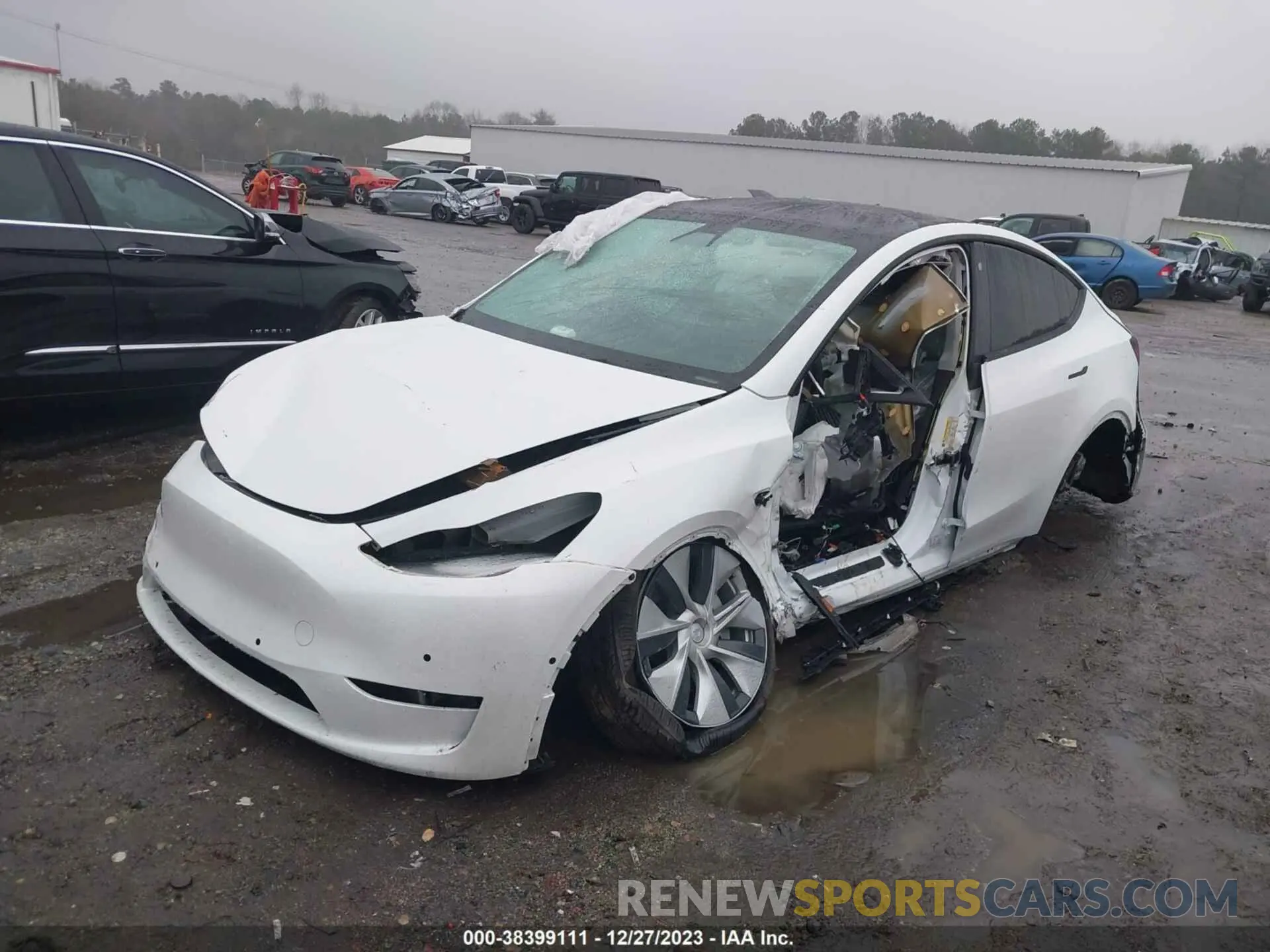 2 fotografías del automóvil dañado 5YJYGDEEOMF118986 TESLA MODEL Y 2021