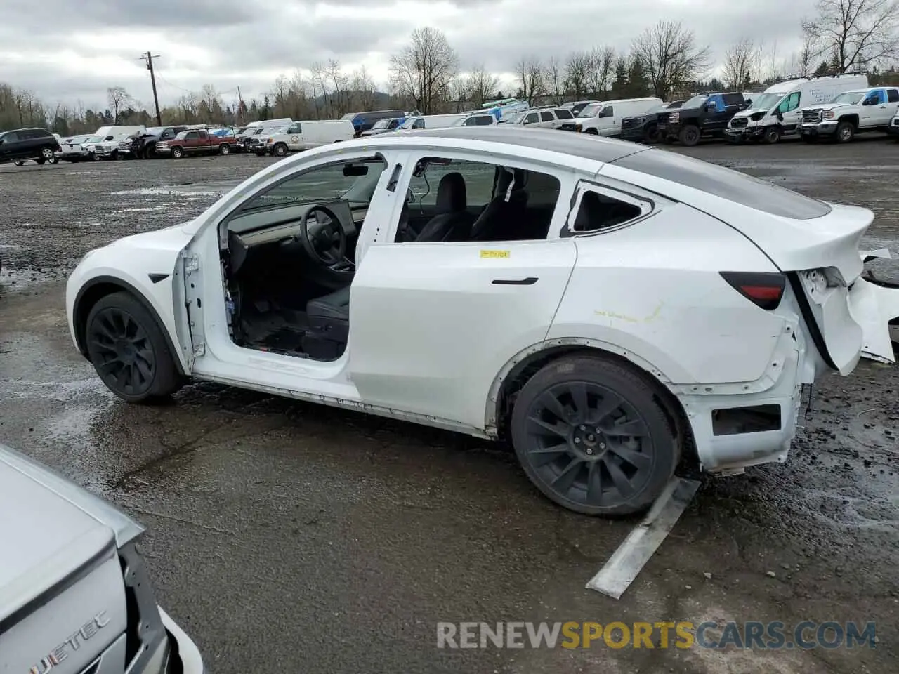 2 fotografías del automóvil dañado 5YJYGDEEXMF079761 TESLA MODEL Y 2021