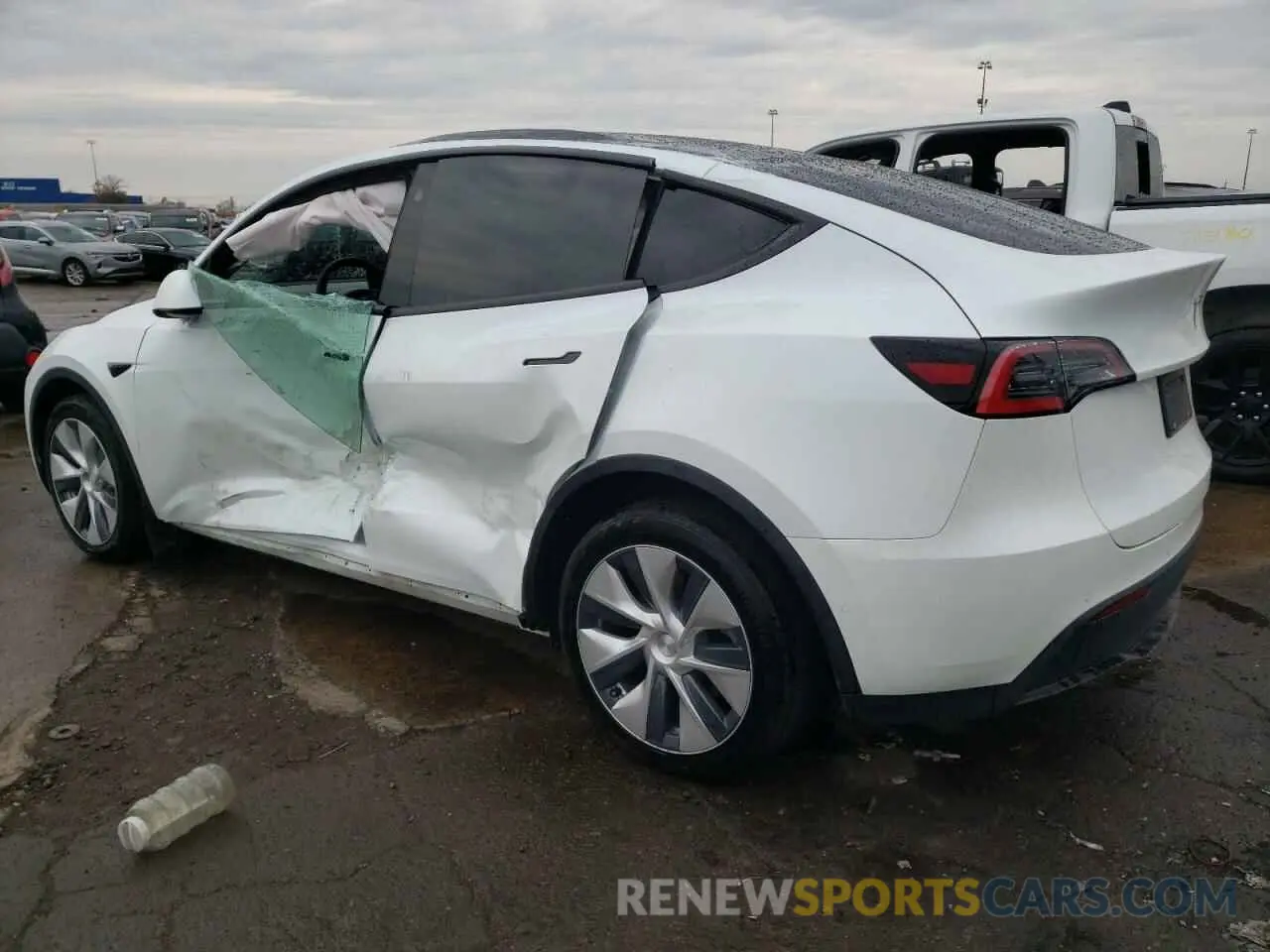 2 fotografías del automóvil dañado 5YJYGDEEXMF083826 TESLA MODEL Y 2021