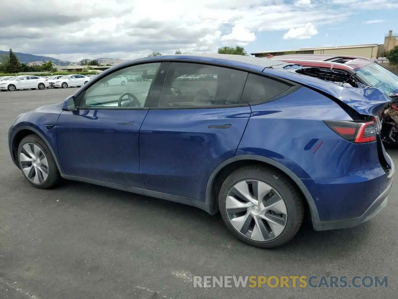 2 fotografías del automóvil dañado 5YJYGDEEXMF090050 TESLA MODEL Y 2021