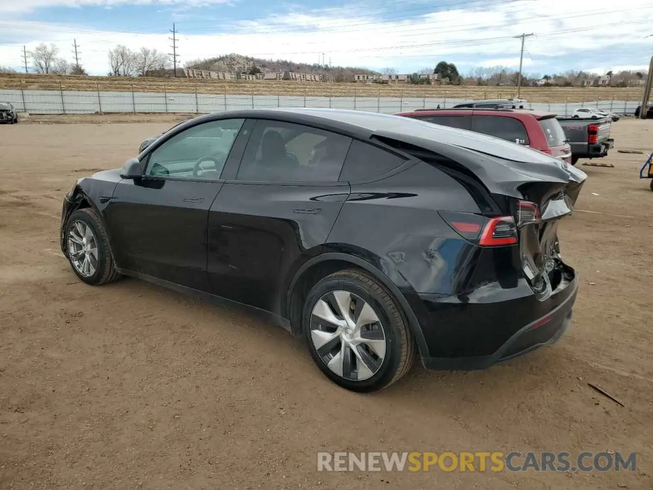 2 fotografías del automóvil dañado 5YJYGDEEXMF142180 TESLA MODEL Y 2021