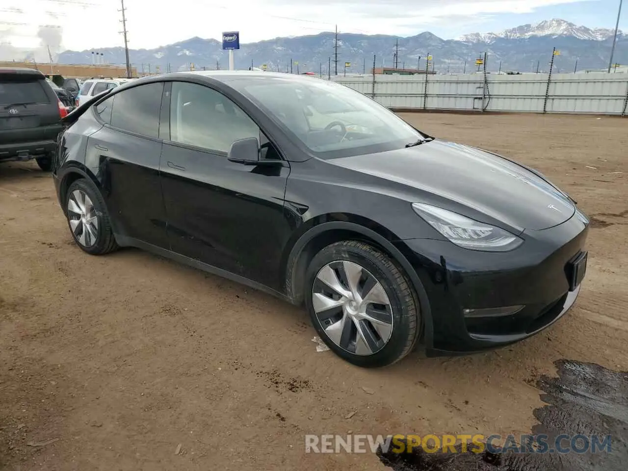 4 fotografías del automóvil dañado 5YJYGDEEXMF142180 TESLA MODEL Y 2021