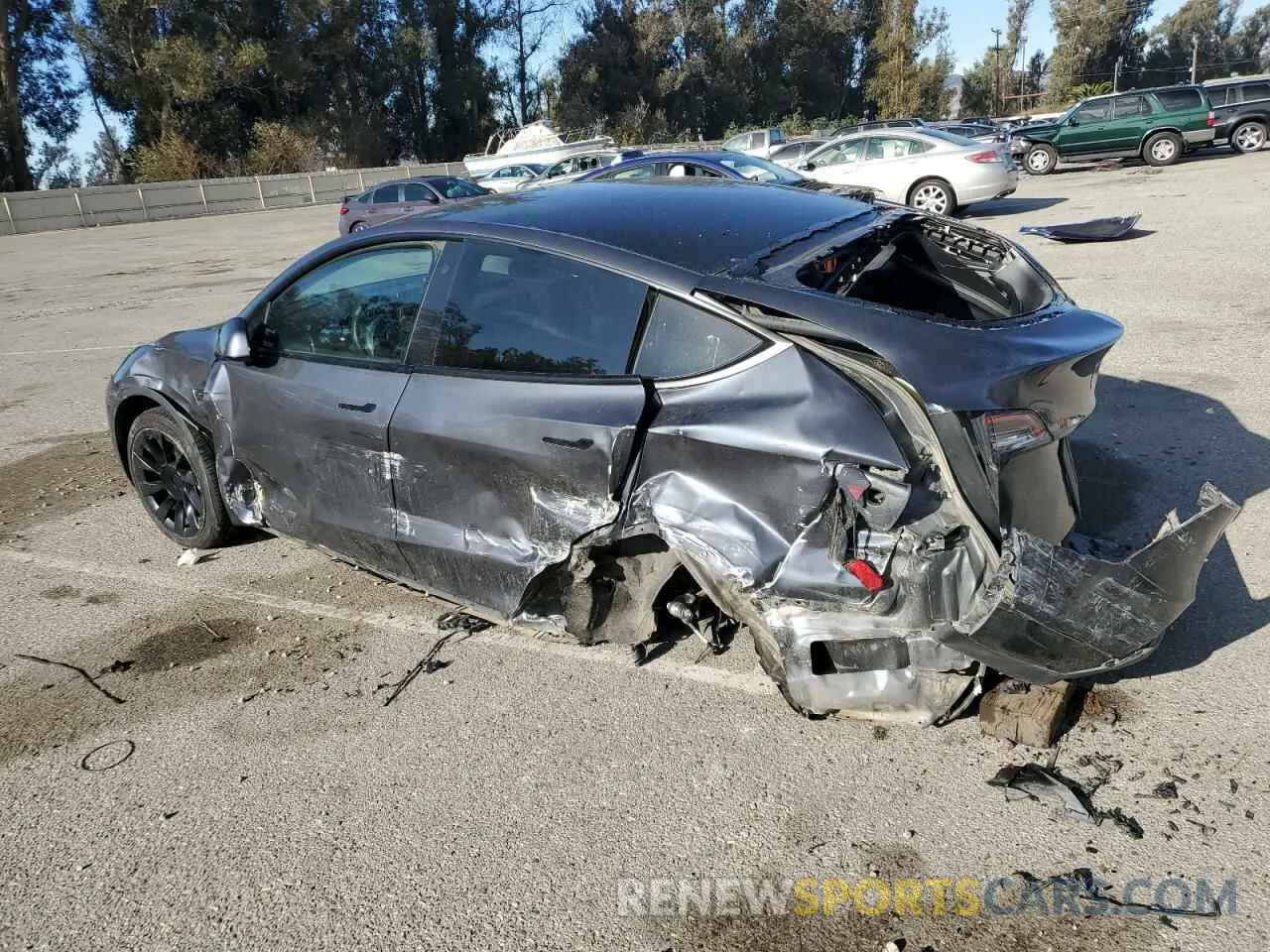 2 fotografías del automóvil dañado 5YJYGDEEXMF217475 TESLA MODEL Y 2021