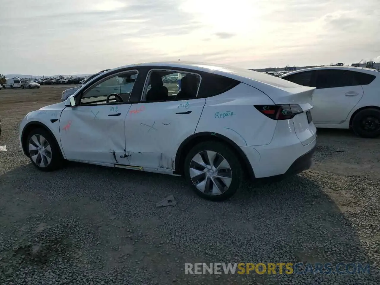 2 fotografías del automóvil dañado 5YJYGDEEXMF244899 TESLA MODEL Y 2021