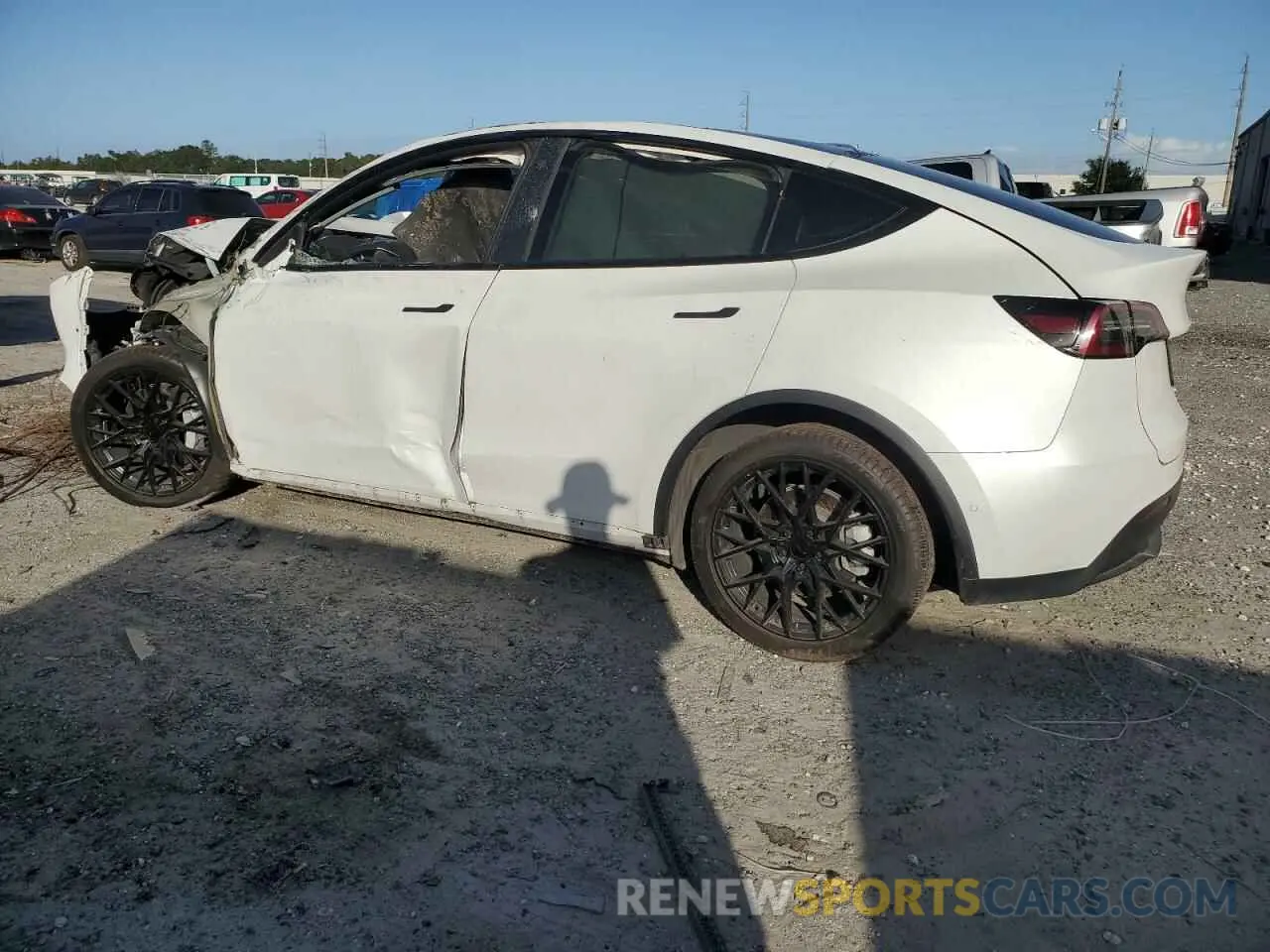 2 fotografías del automóvil dañado 5YJYGDEEXMF278518 TESLA MODEL Y 2021