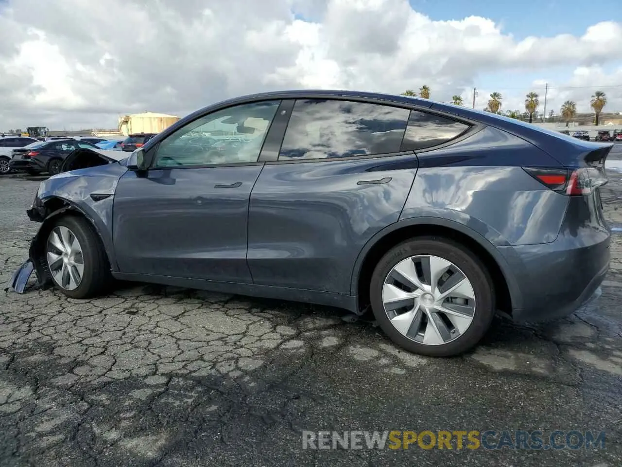 2 fotografías del automóvil dañado 5YJYGDEEXMF278664 TESLA MODEL Y 2021
