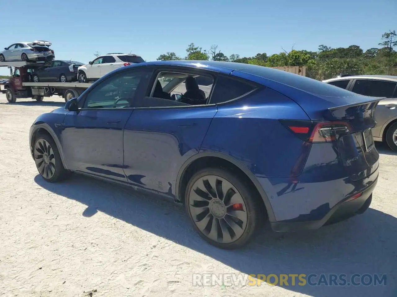 2 fotografías del automóvil dañado 5YJYGDEF0MF243544 TESLA MODEL Y 2021