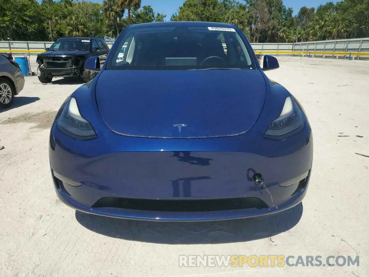5 fotografías del automóvil dañado 5YJYGDEF0MF243544 TESLA MODEL Y 2021