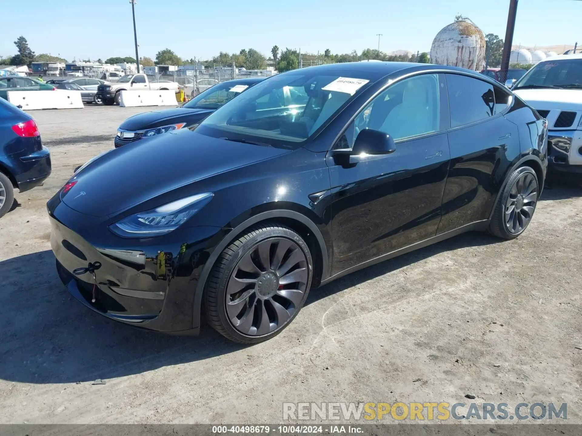 2 fotografías del automóvil dañado 5YJYGDEF2MF097986 TESLA MODEL Y 2021