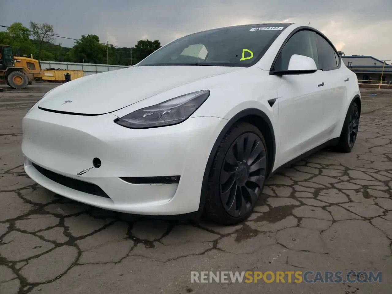 2 fotografías del automóvil dañado 5YJYGDEF2MF124460 TESLA MODEL Y 2021