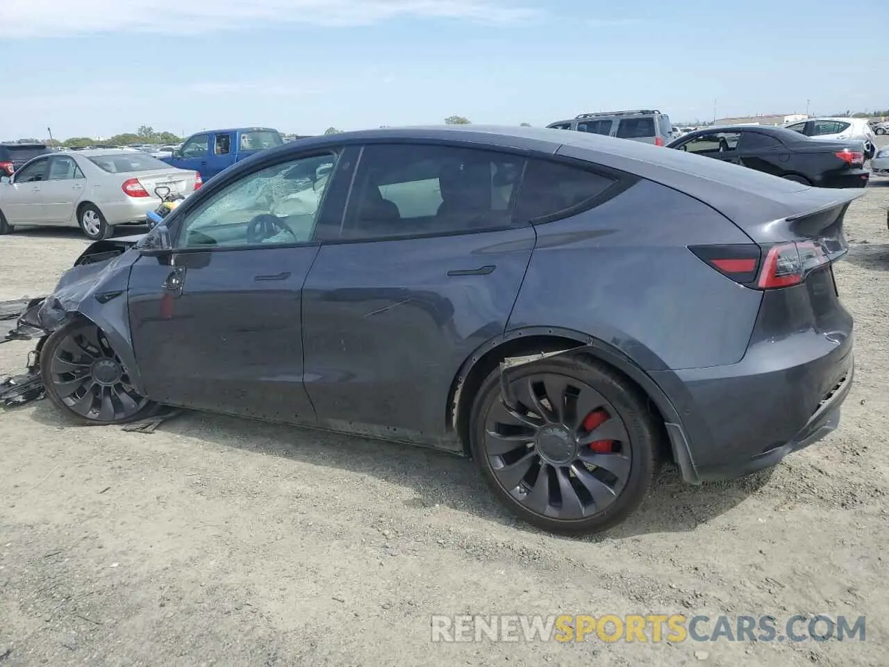 2 fotografías del automóvil dañado 5YJYGDEF2MF262273 TESLA MODEL Y 2021