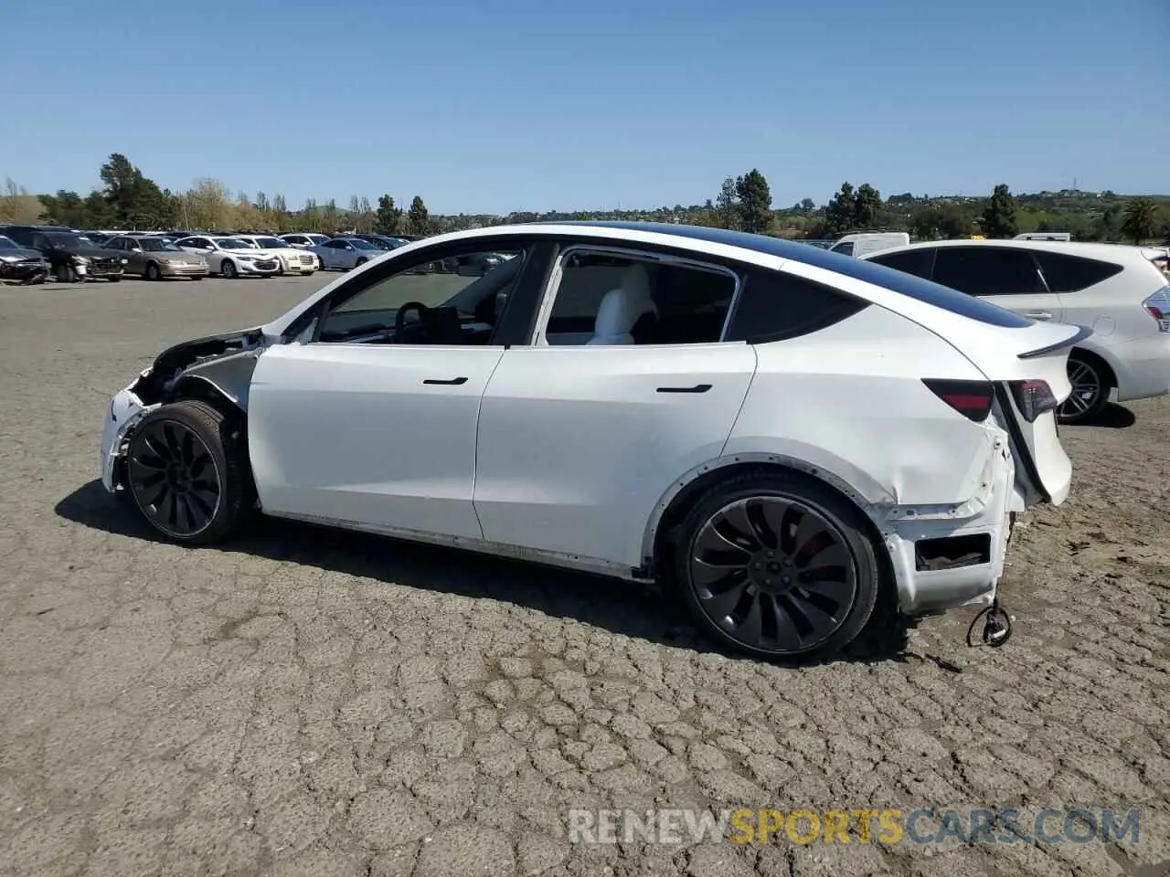 2 fotografías del automóvil dañado 5YJYGDEF2MF277467 TESLA MODEL Y 2021