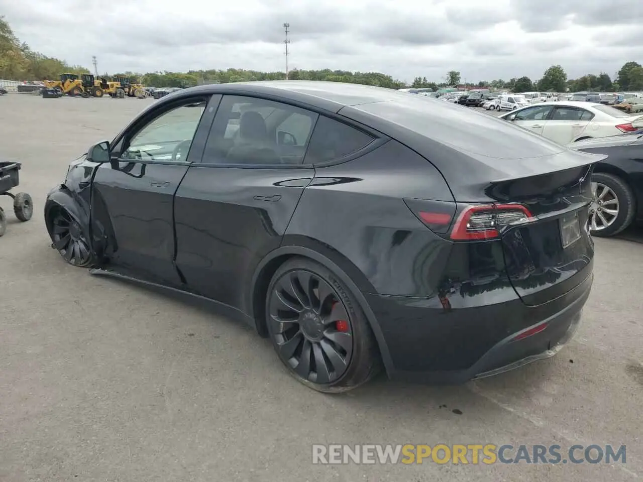 2 fotografías del automóvil dañado 5YJYGDEF4MF139588 TESLA MODEL Y 2021