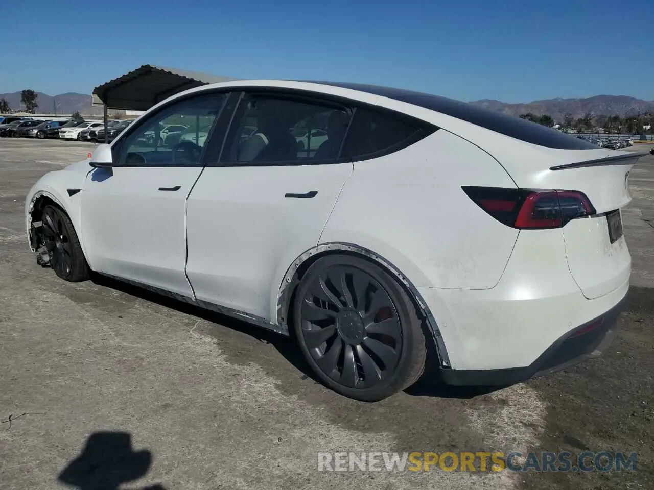 2 fotografías del automóvil dañado 5YJYGDEF4MF211602 TESLA MODEL Y 2021