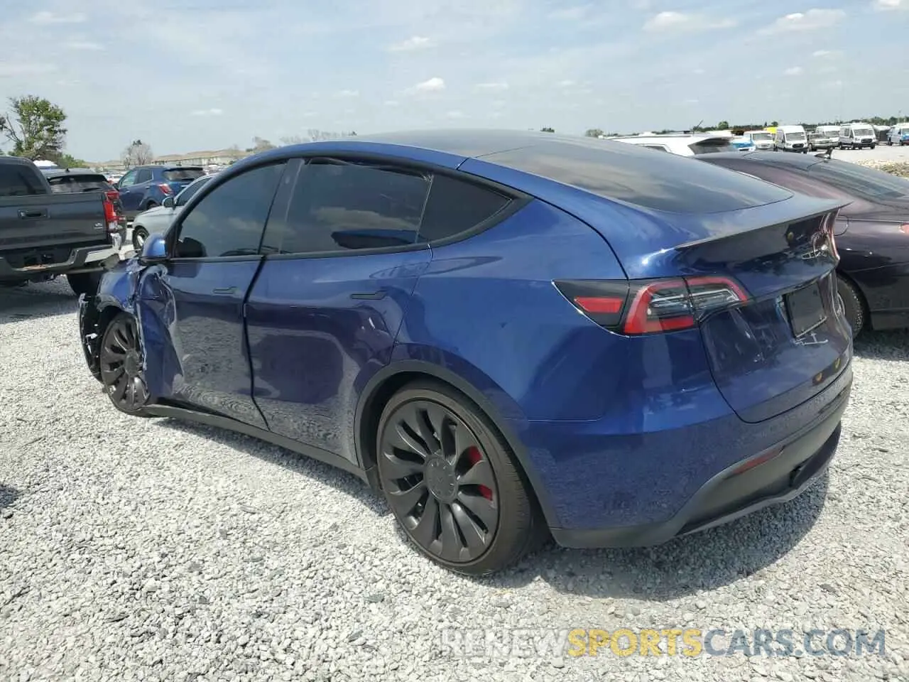 2 fotografías del automóvil dañado 5YJYGDEF5MF194681 TESLA MODEL Y 2021