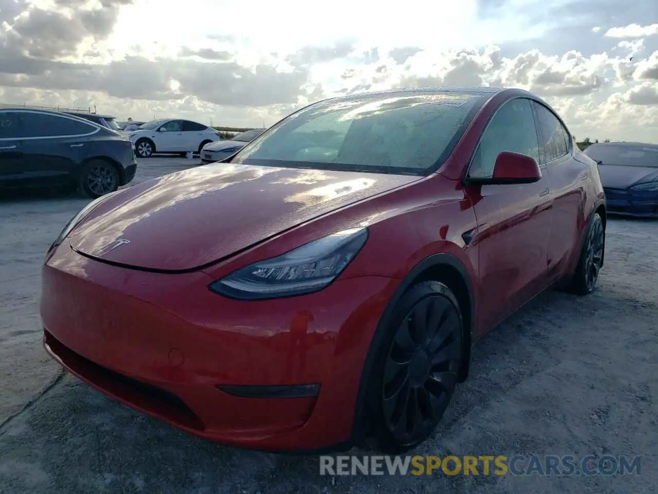 2 fotografías del automóvil dañado 5YJYGDEF6MF073173 TESLA MODEL Y 2021