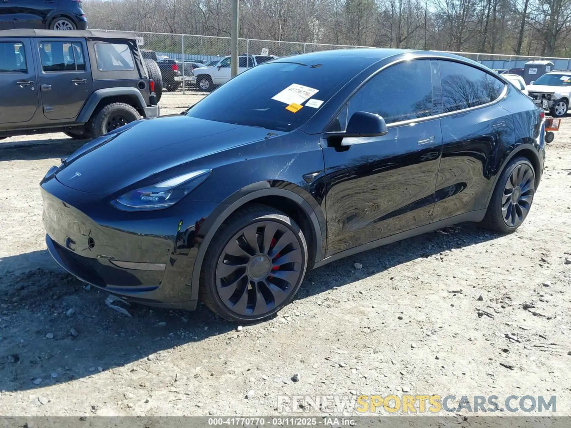 2 fotografías del automóvil dañado 5YJYGDEF6MF252877 TESLA MODEL Y 2021