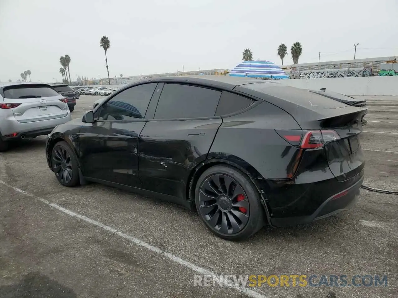 2 fotografías del automóvil dañado 5YJYGDEF7MF195038 TESLA MODEL Y 2021