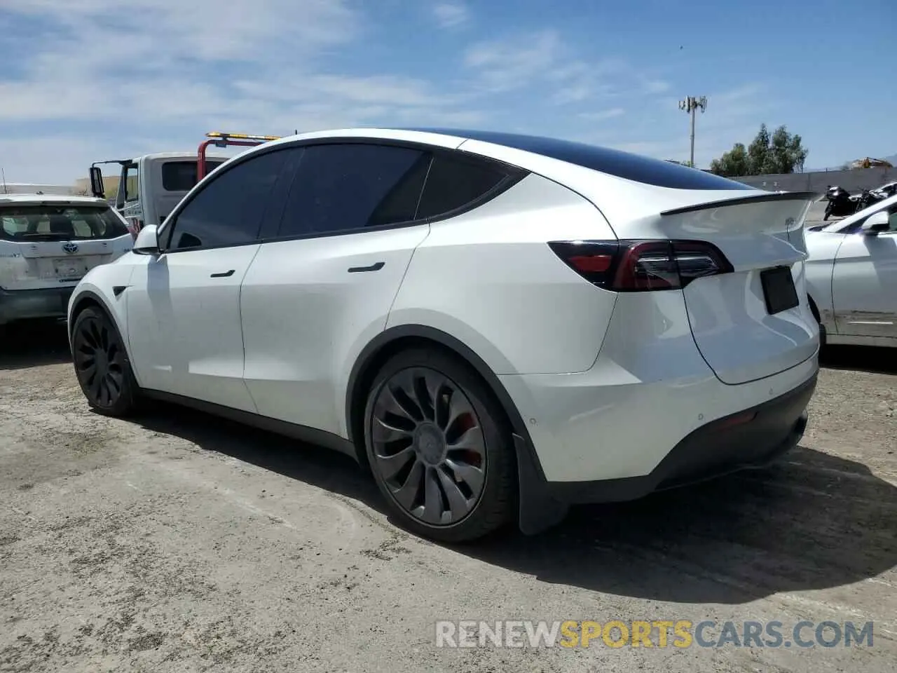 2 fotografías del automóvil dañado 5YJYGDEFXMF293903 TESLA MODEL Y 2021