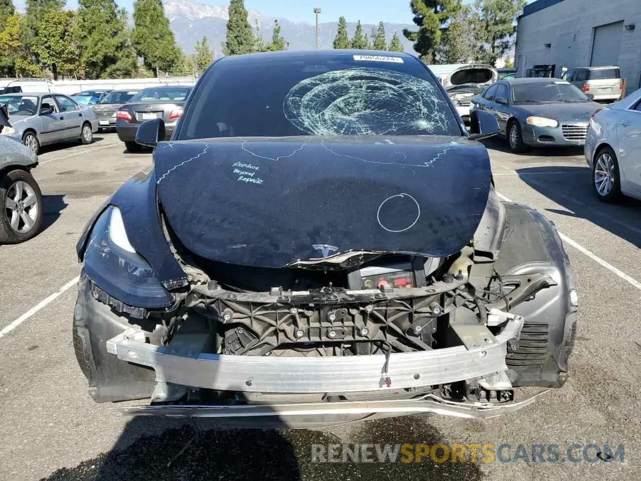 5 fotografías del automóvil dañado 7SAYGAEE0NF342603 TESLA MODEL Y 2022