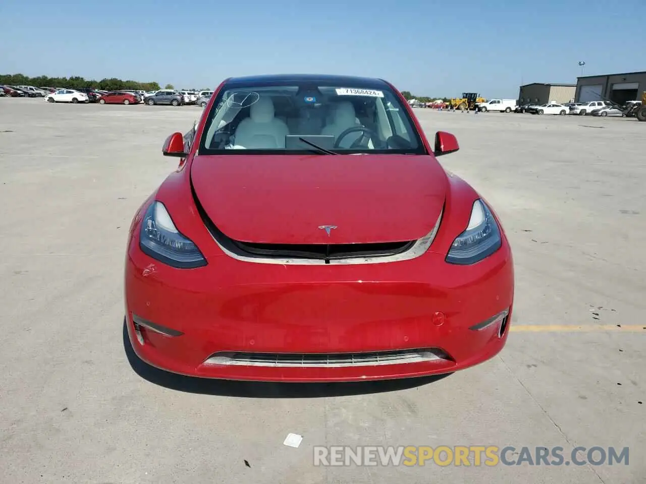 5 fotografías del automóvil dañado 7SAYGAEE0NF414044 TESLA MODEL Y 2022