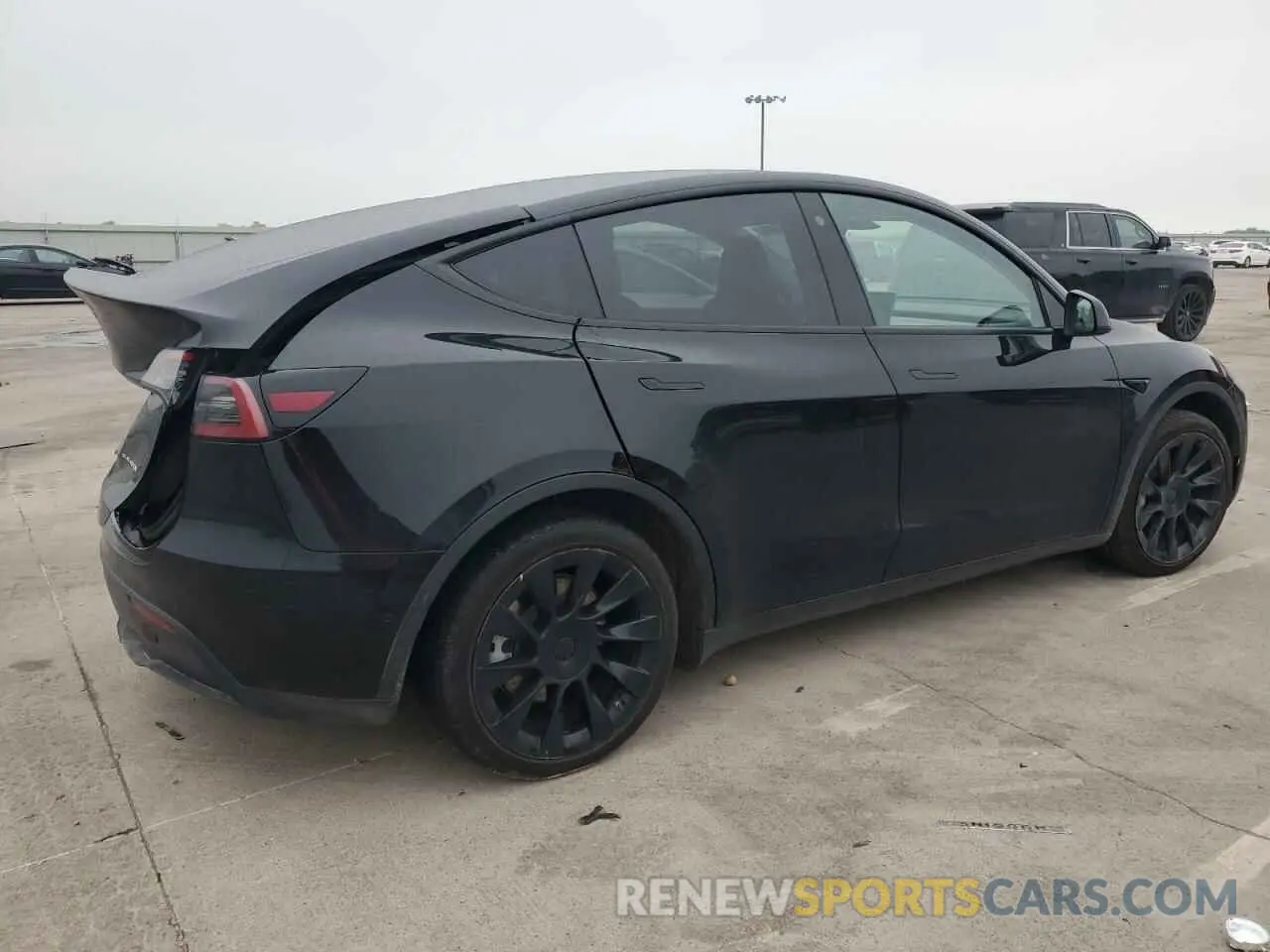 3 fotografías del automóvil dañado 7SAYGAEE1NF381491 TESLA MODEL Y 2022