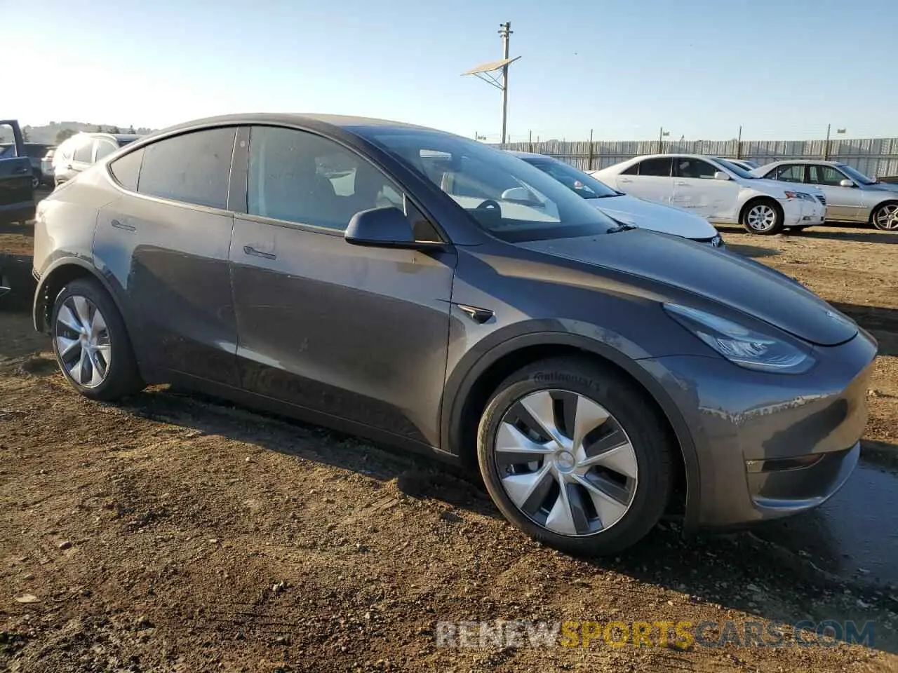 4 fotografías del automóvil dañado 7SAYGAEE2NF364179 TESLA MODEL Y 2022
