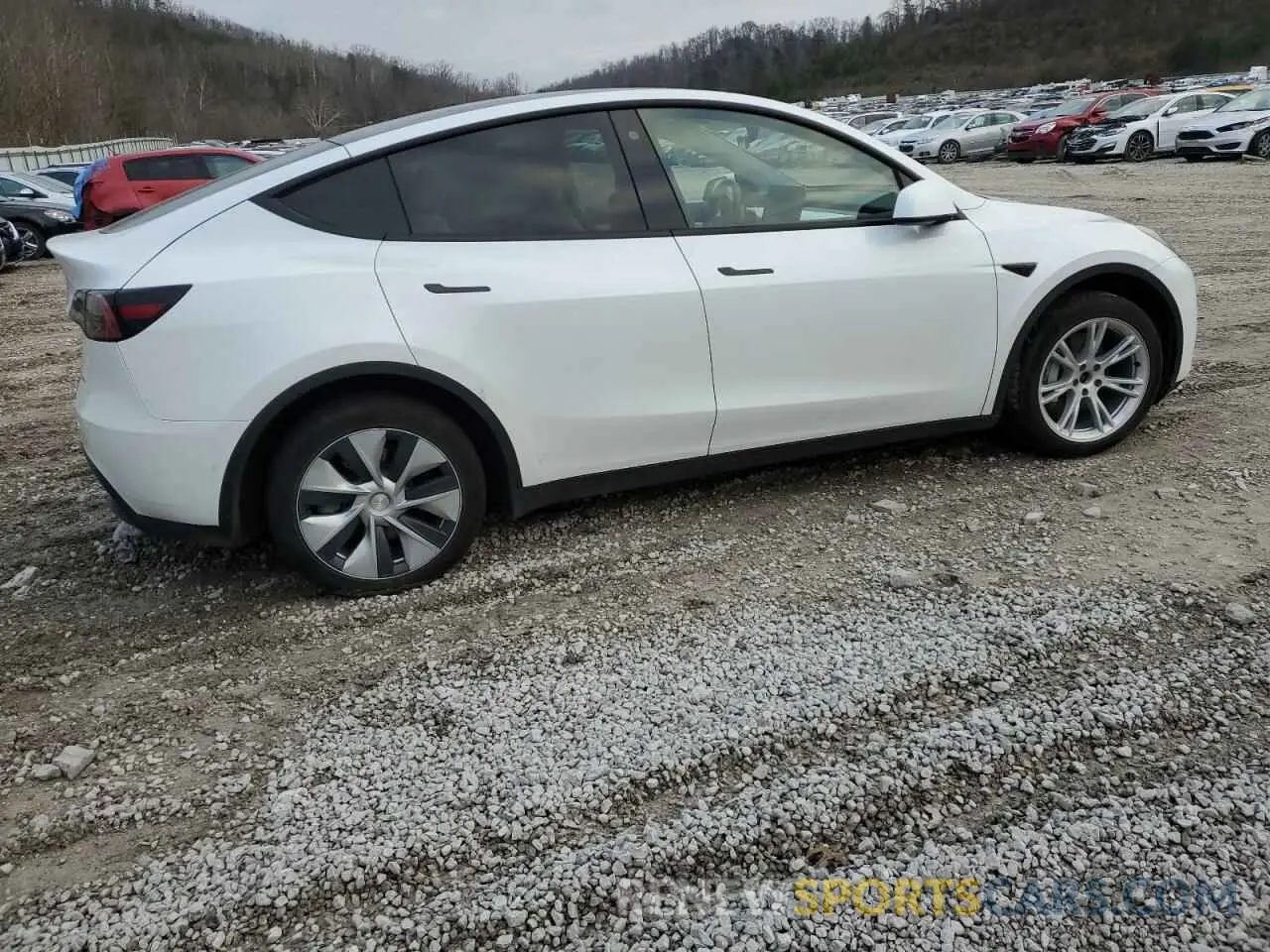 3 fotografías del automóvil dañado 7SAYGAEE3NF467627 TESLA MODEL Y 2022