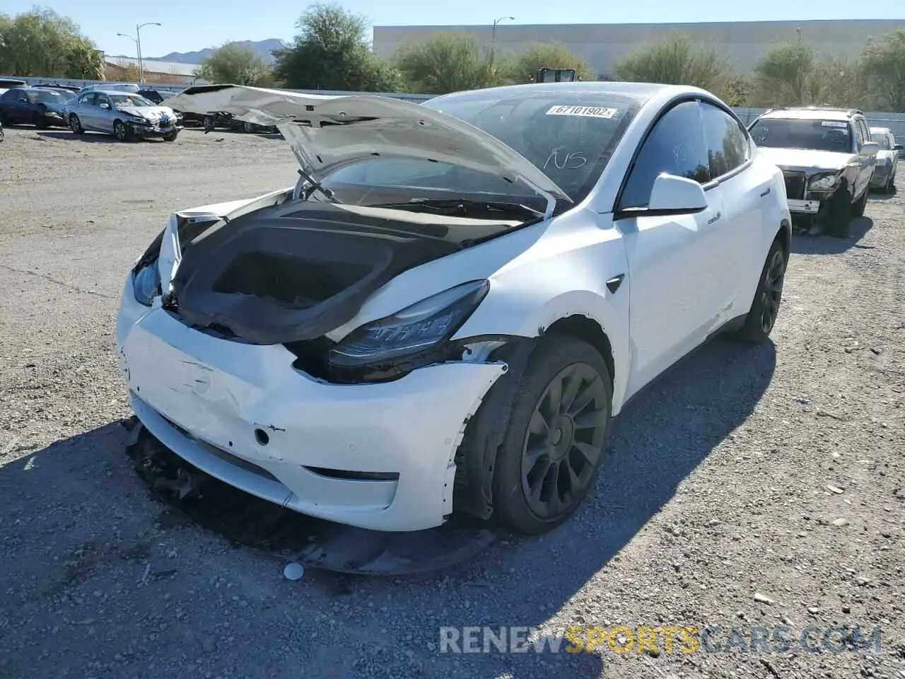 2 fotografías del automóvil dañado 7SAYGAEE4NF315310 TESLA MODEL Y 2022