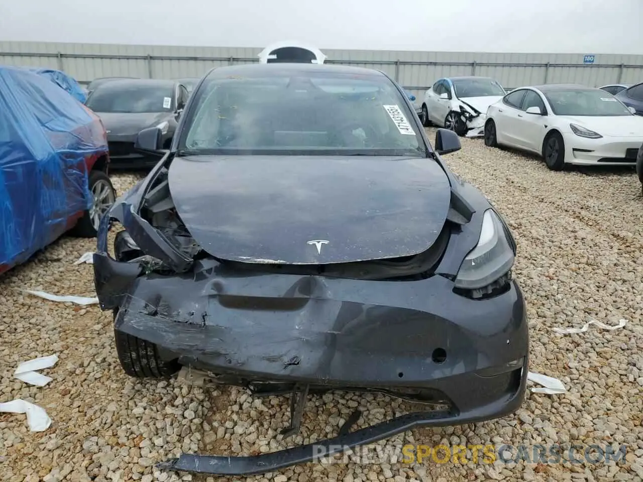 5 fotografías del automóvil dañado 7SAYGAEE4NF543503 TESLA MODEL Y 2022