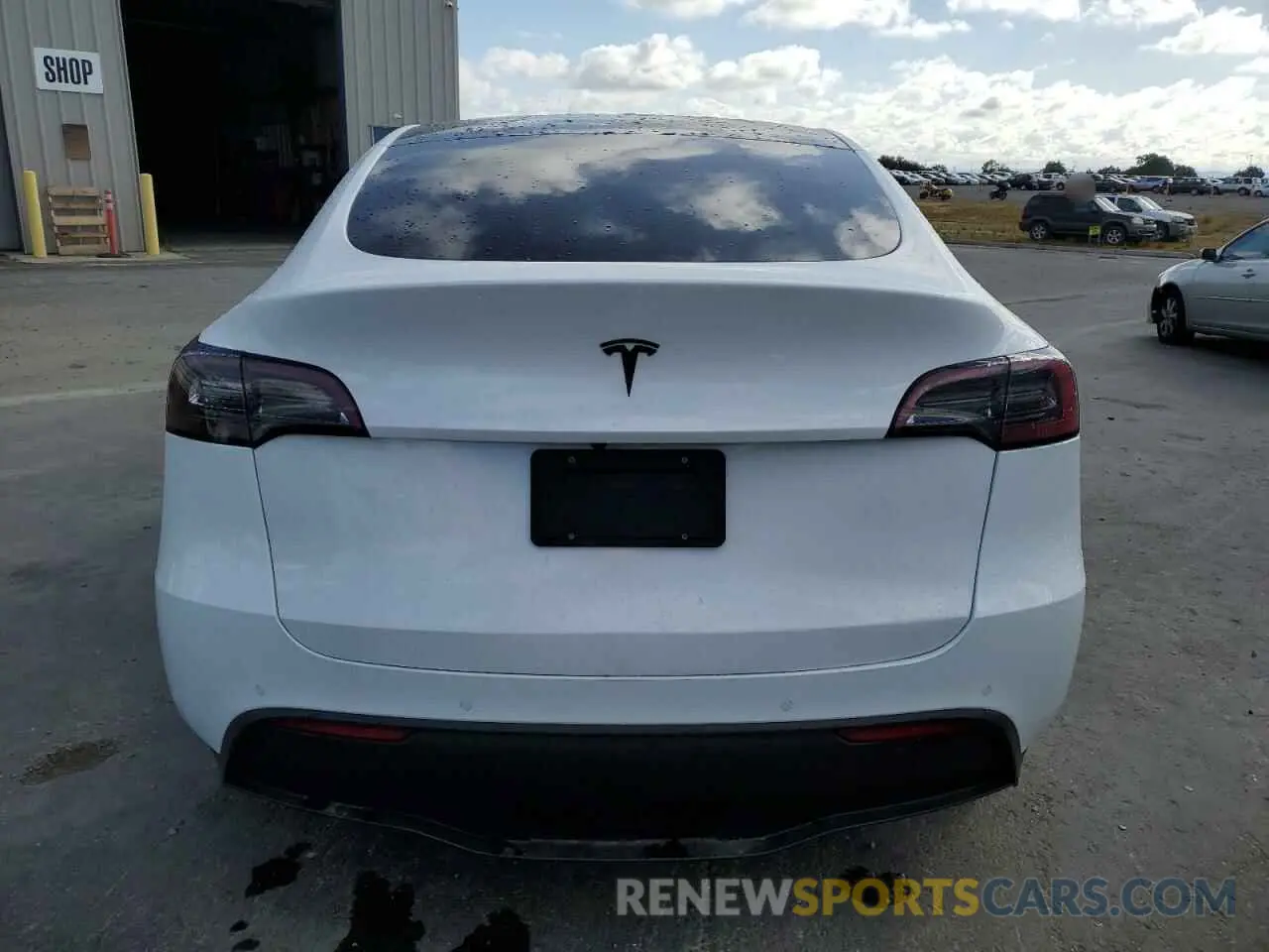 6 fotografías del automóvil dañado 7SAYGAEE5NF427064 TESLA MODEL Y 2022