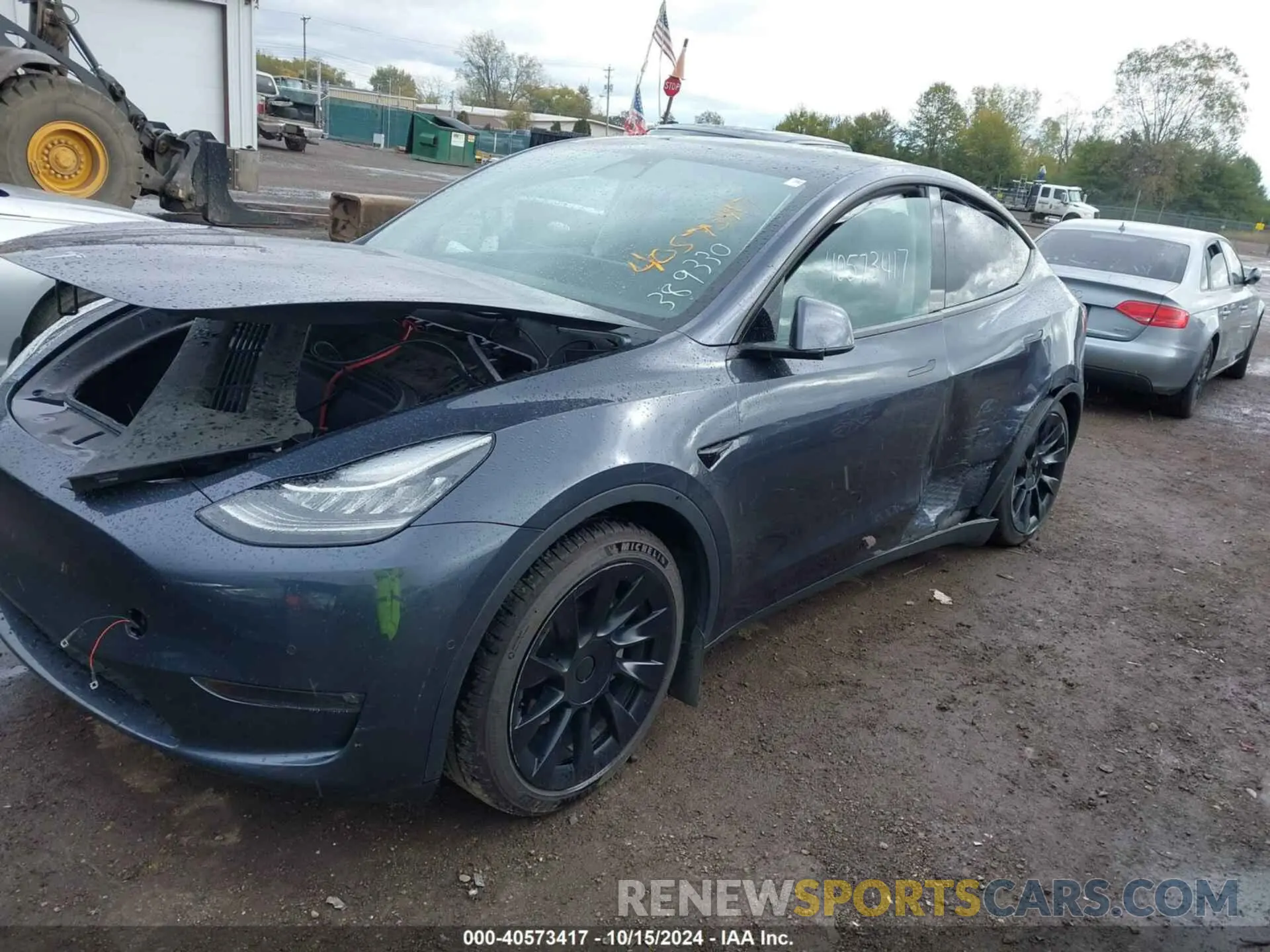 2 fotografías del automóvil dañado 7SAYGAEE6NF389330 TESLA MODEL Y 2022