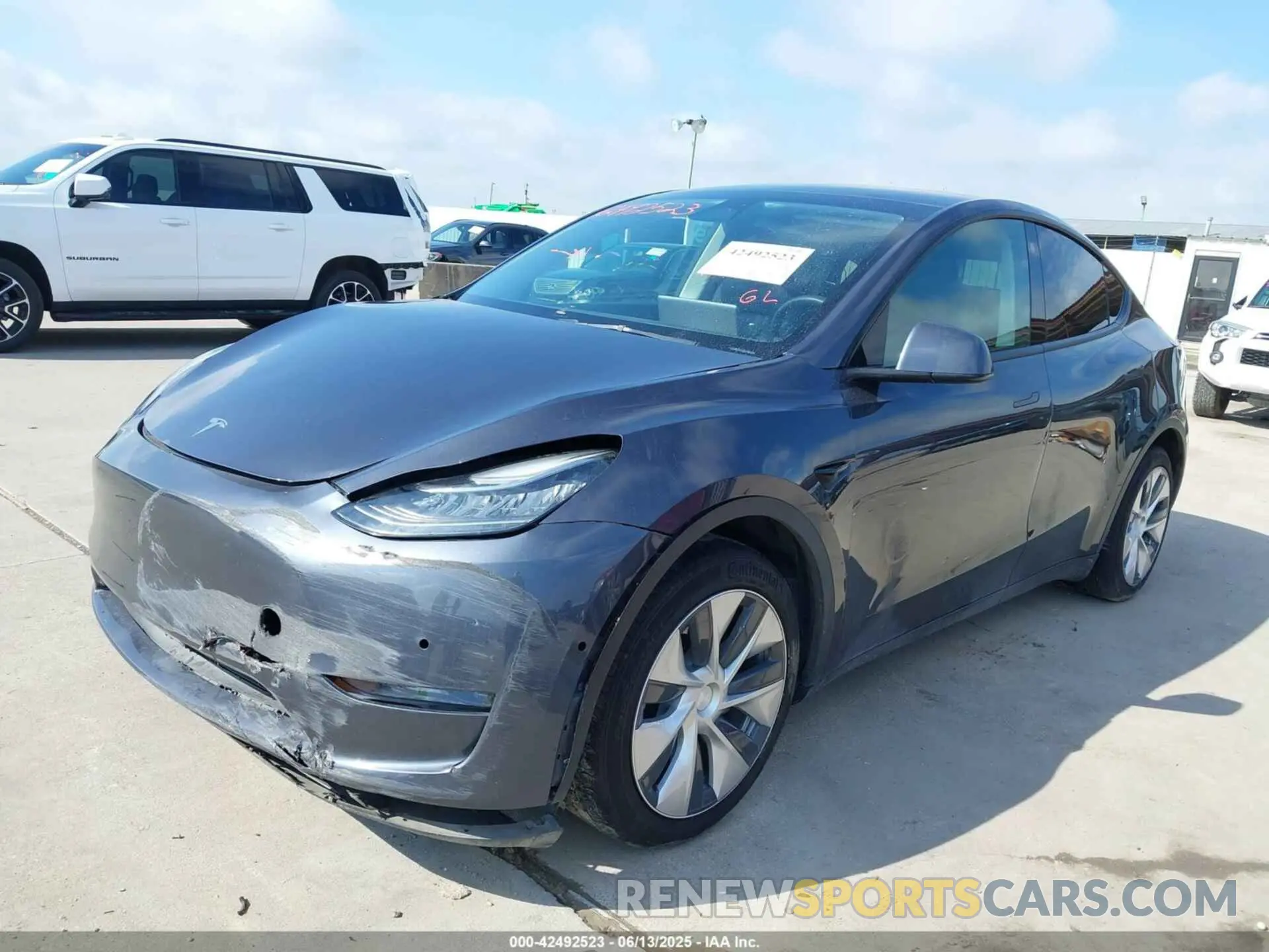 2 fotografías del automóvil dañado 7SAYGAEE7NF389319 TESLA MODEL Y 2022