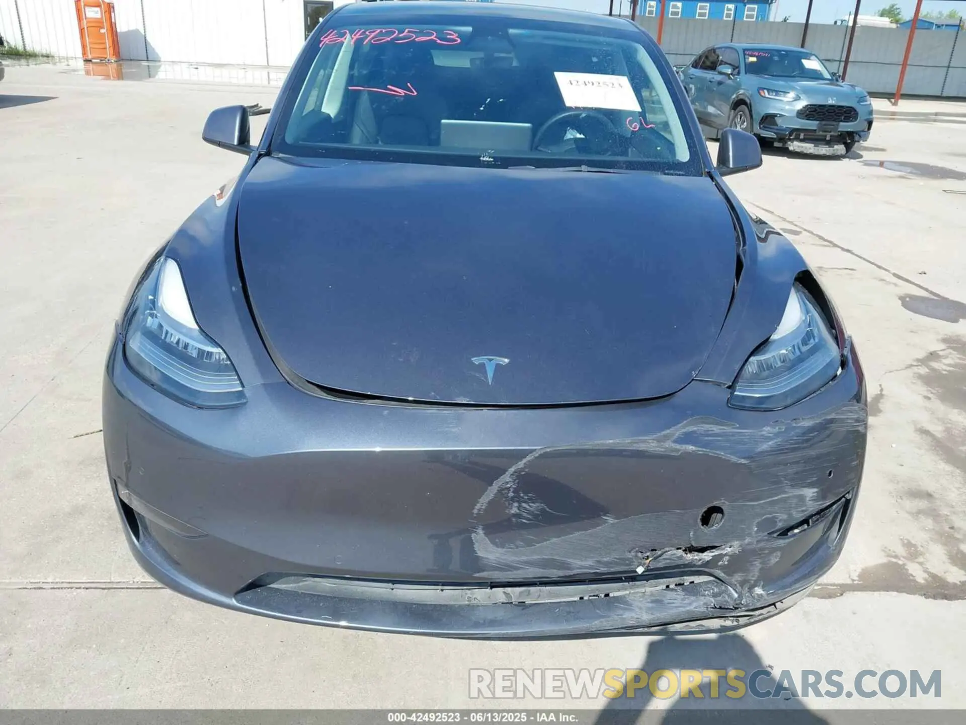 6 fotografías del automóvil dañado 7SAYGAEE7NF389319 TESLA MODEL Y 2022