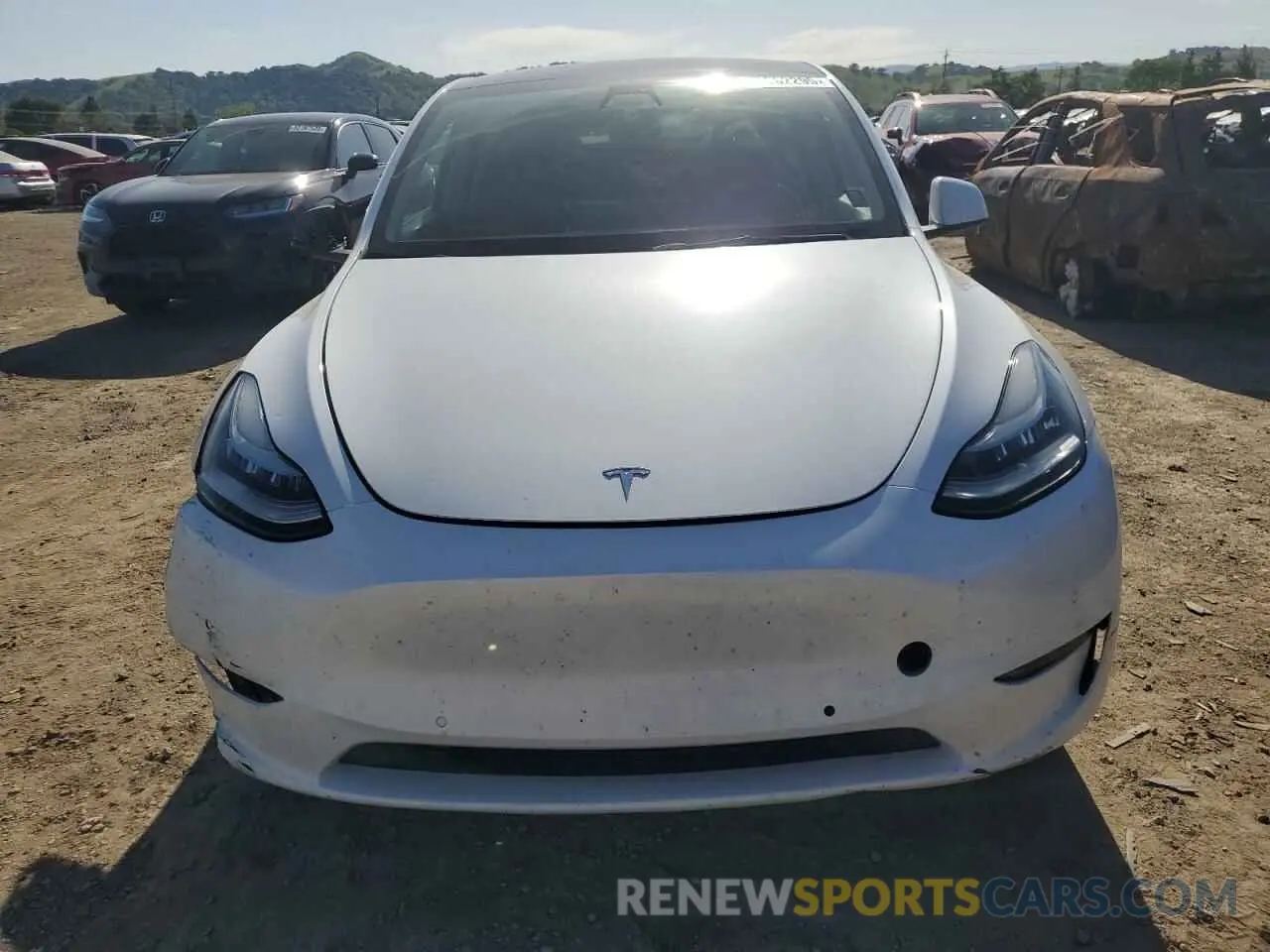 5 fotografías del automóvil dañado 7SAYGAEE9NF352658 TESLA MODEL Y 2022